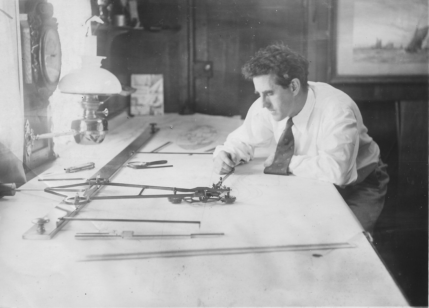 Uffa at work in the design office on his floating bridge
